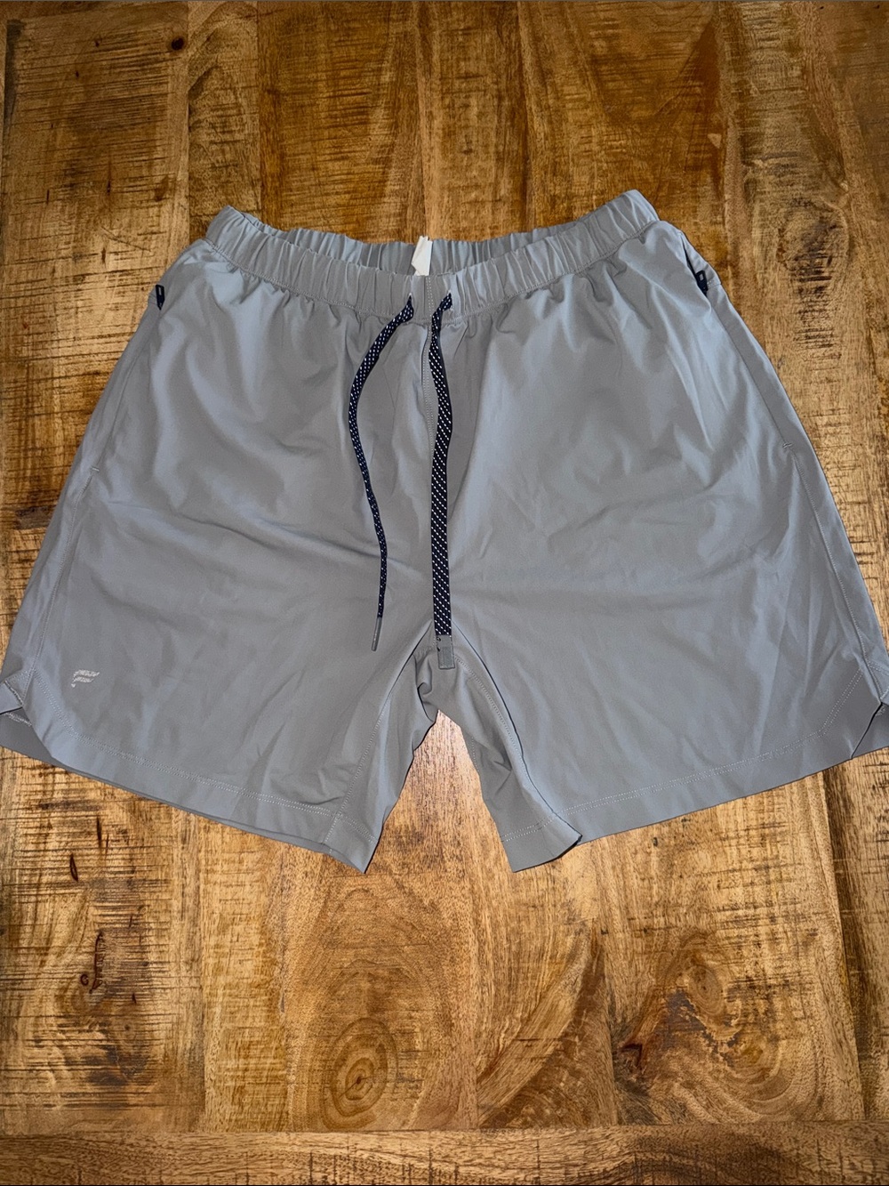 Fabletics Men's Athletic Shorts in Light Gray with Navy Drawstring